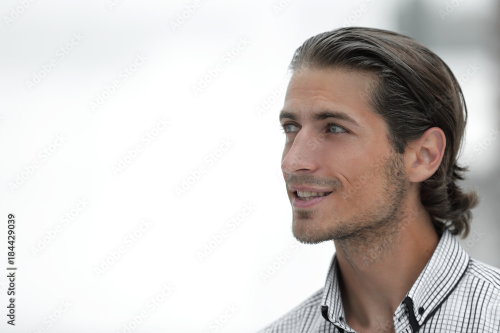 Fototapeta premium young business man looking at copy space