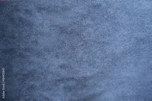 Surface of simple blue suede from above © Anna
