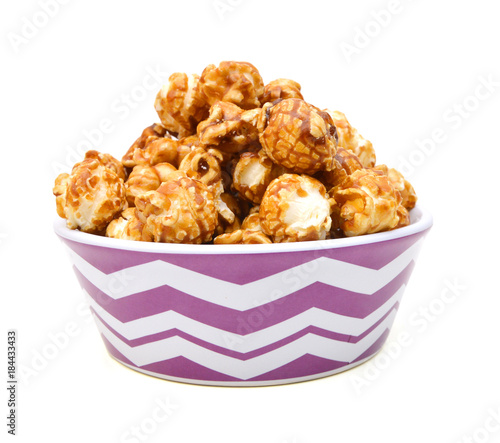 Popcorn isolated in bowl on the white background