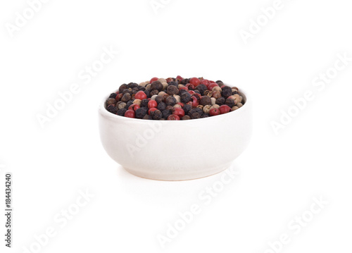 Peppercorn mix in bowl on the white background
