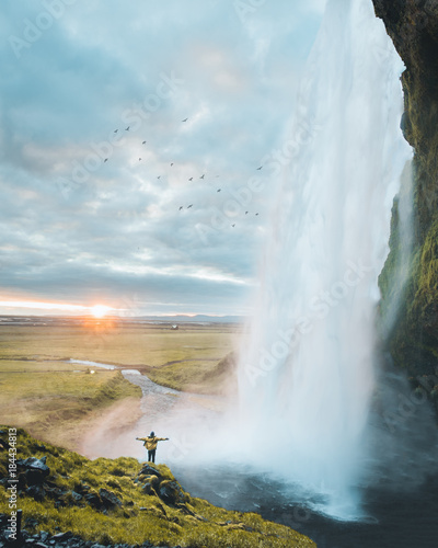 beautiful waterfall with sunset in iceland