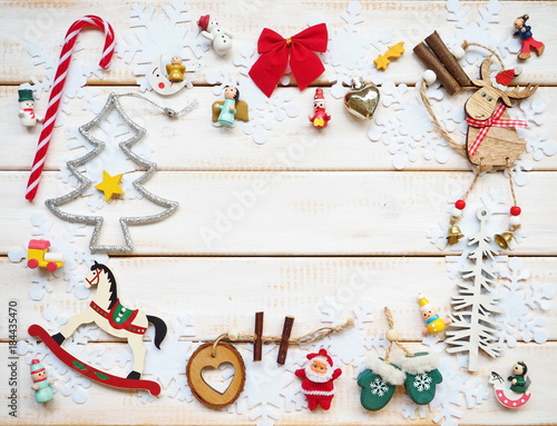 Group of Christmas decoration on white wooden background photo