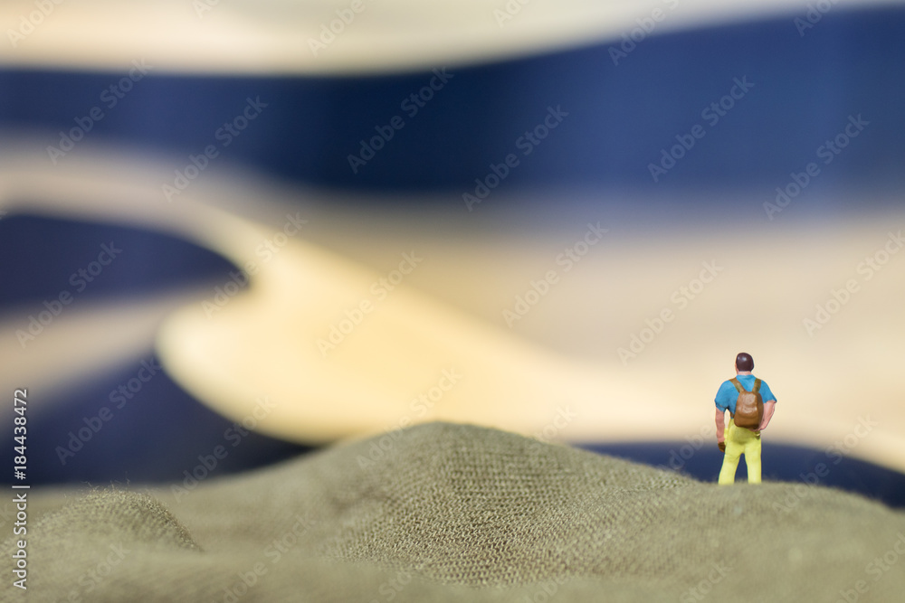 lonely traveler wanders over the sand dunes