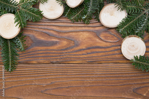 Wooden Christmas or New Year background with a natural frame