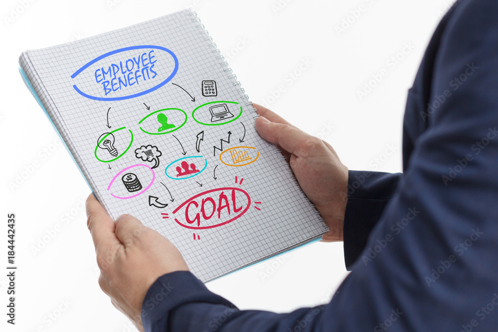 The concept of business, technology, the Internet and the network. A young businessman shows a successful scheme of work: Employee benefits The concept of business, technology, the Internet and the network. A young businessman shows a successful scheme of work: Employee benefits