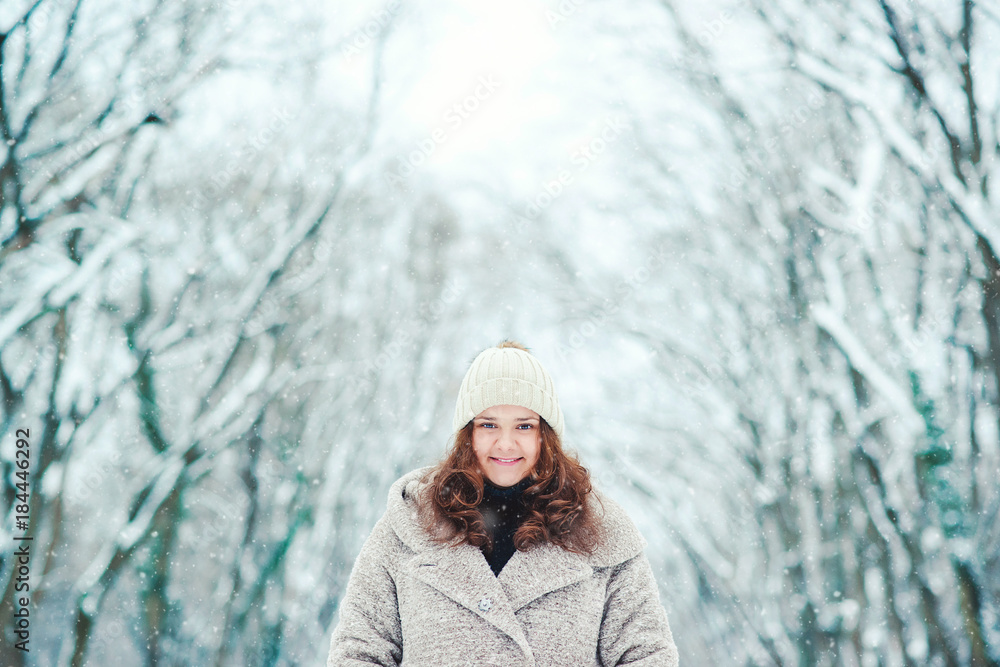 Happy young woman in wintertime, walk in nature. Happy young woman in wintertime, walk in nature.