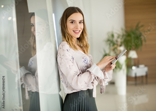 Young businesswoman standin...