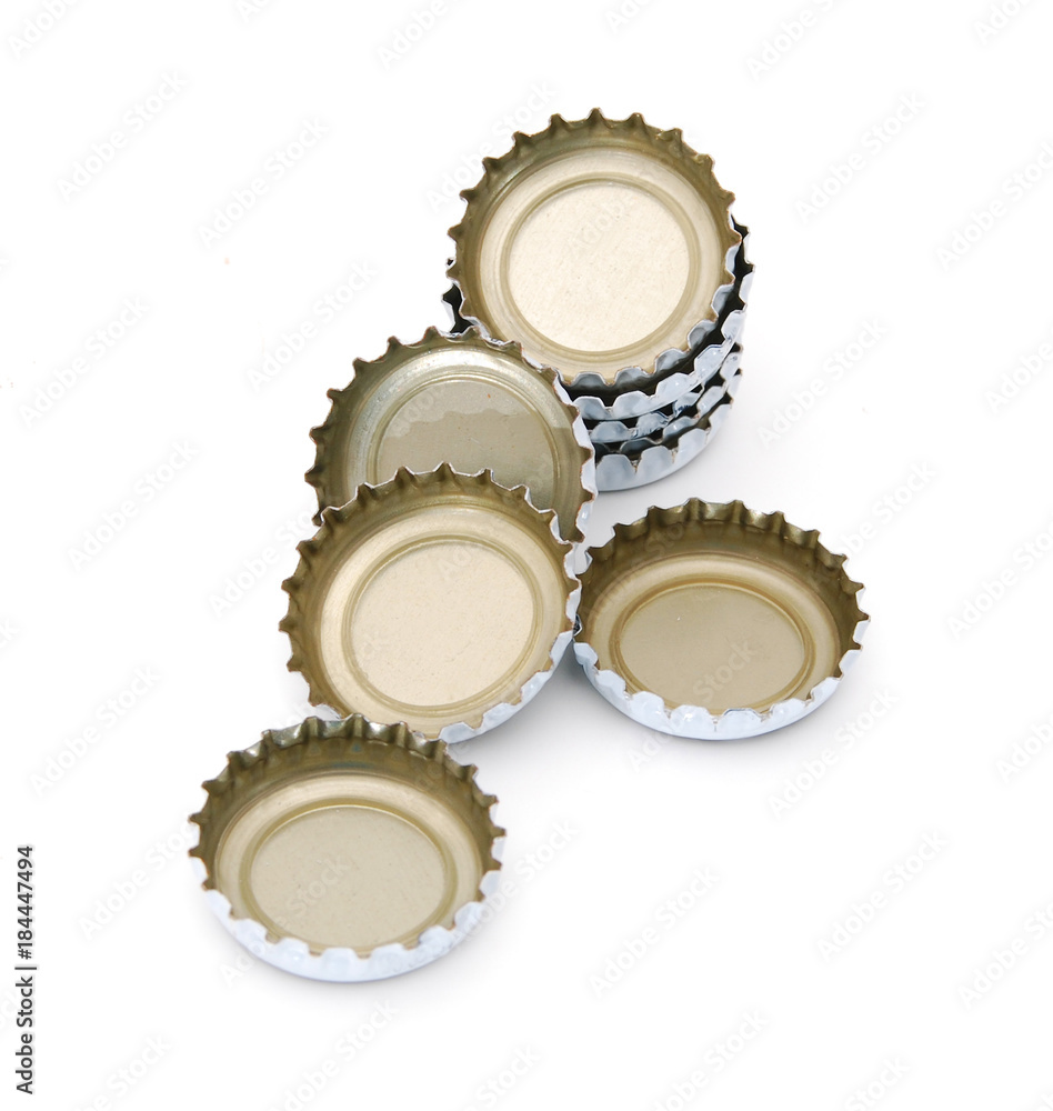 Decorative beer caps on white background Decorative beer caps on white background