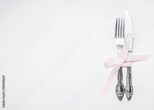 composition by February 14 knife and fork tied with ribbon, place for text, top view