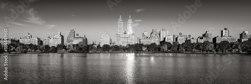 Sunrise on the Upper West Side with view of the Central Park Reservoir in Black & White (panoramic). Manhattan, New York City