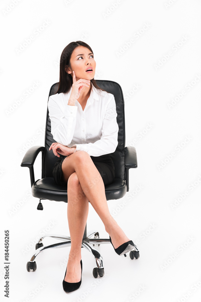 Portrait of a pensive asian businesswoman in eyeglasses Portrait of a pensive asian businesswoman in eyeglasses