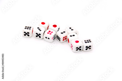 Dice lined on the white floor
