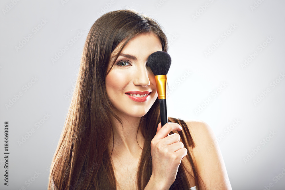 Beautyful woman applying make up with brush. Beautyful woman applying make up with brush.