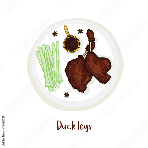Duck legs on plate with sauce, celery and anise