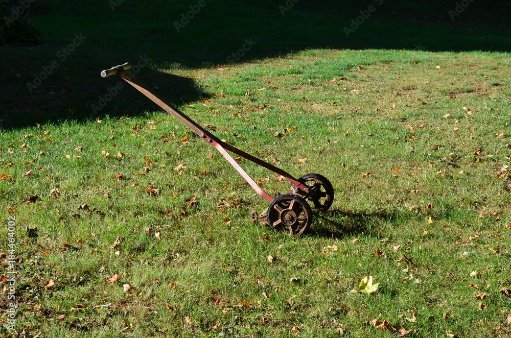 A very old reel type push mower Stock Photo