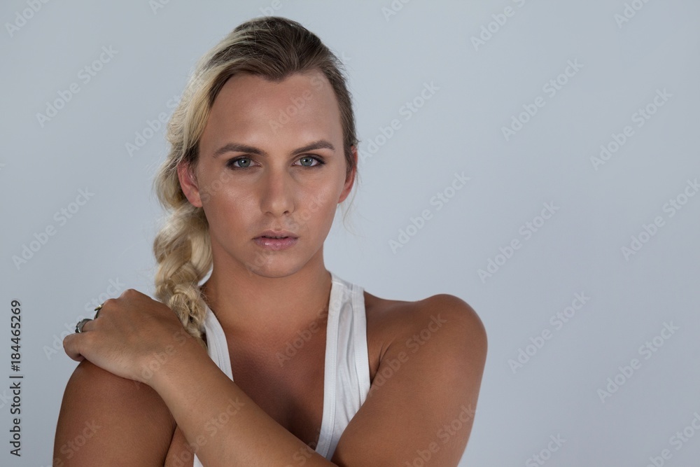 Portrait of confident transgender with braided hair Portrait of confident transgender with braided hair