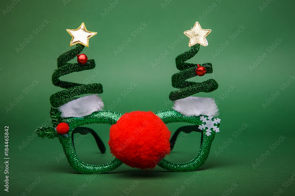 Christmas glasses decorated with Christmas three and big red nos Christmas glasses decorated with Christmas three and big red nos