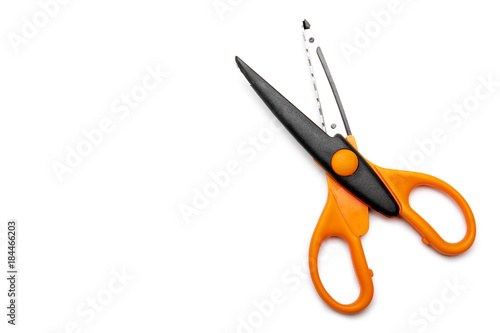 Orange and decoratice scissors, included clipping path photo