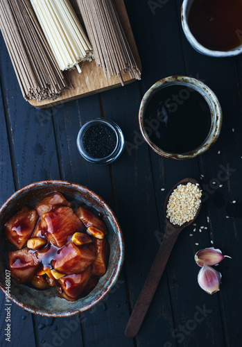 Raw chicken fillet marinated in teriyaki sauce for asian wok Chinese food