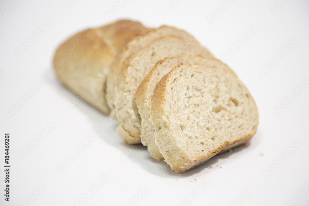 Close-up of sliced bread on white background Close-up of sliced bread on white background