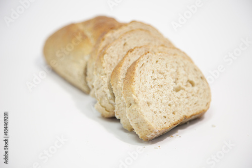Close-up of sliced bread on white background