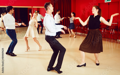 People practicing twist movements