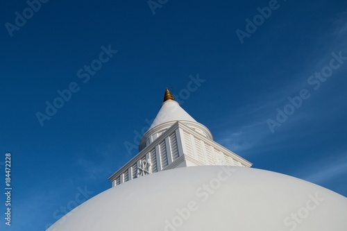 Holy place of Kataragama in Sri Lanka. Detail of the stupa. photo