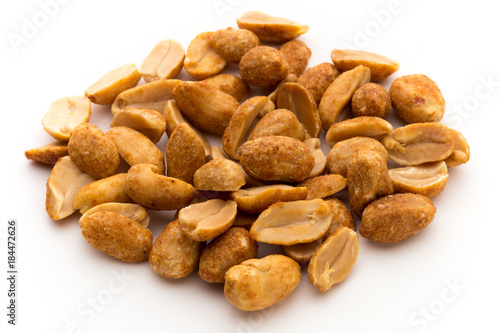 Peeled peanuts on the isolated background.