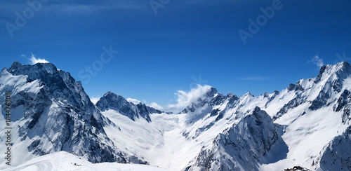 Panoramic view of snow covered mountain peaks © BSANI