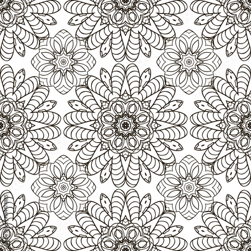 Doodle seamless image. Mandala, circular patterns. White and black