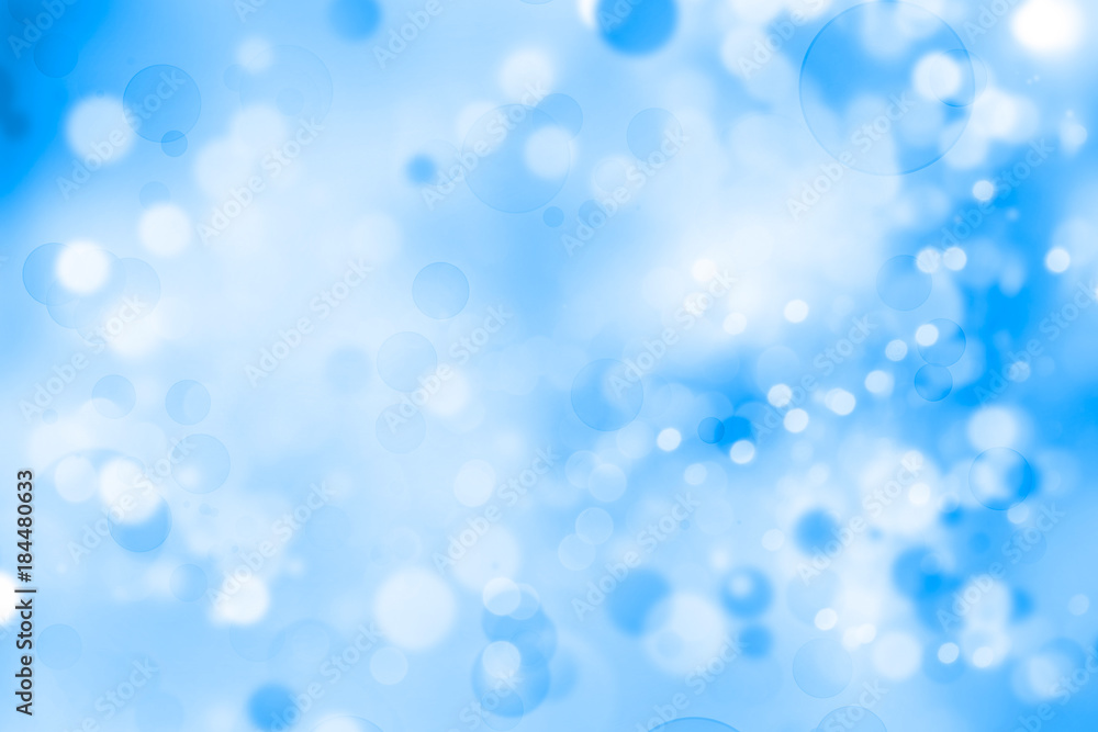 Abstract blue and white bokeh background