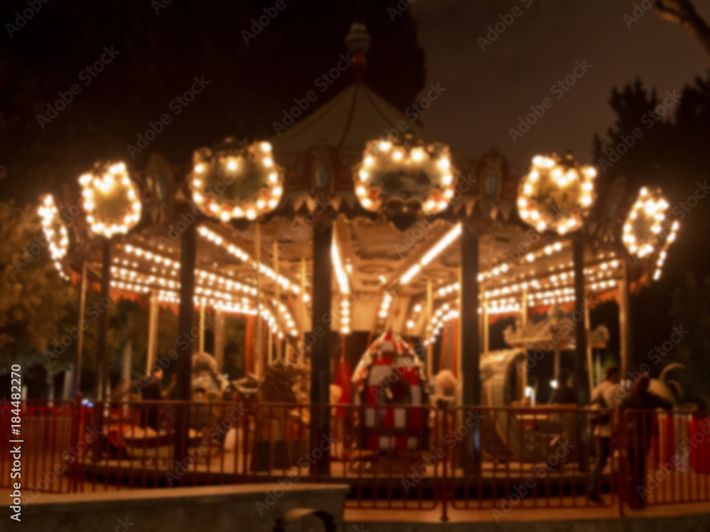 Fototapeta premium Fun fair and night . The beautiful light trails at night in a county carnival