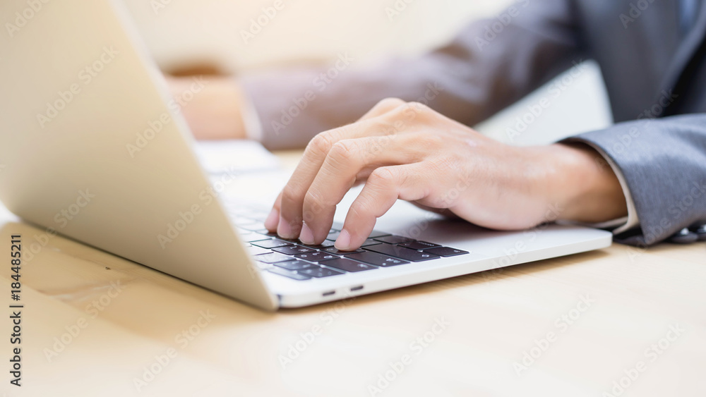 Business team working on laptop, while sitting at office. Business people. Business team working on laptop, while sitting at office. Business people.