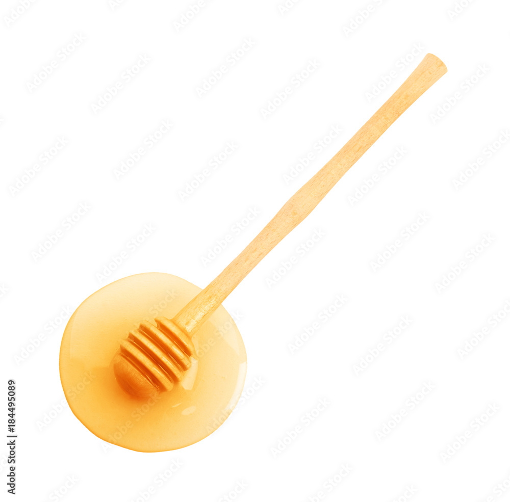 Dipper with honey, isolated on white Dipper with honey, isolated on white