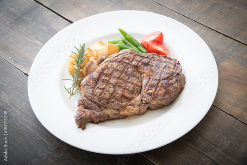 boneless rib eye steak on plate