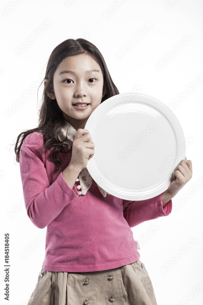 girl(kid) hand hold a empty dish isolated on the white background. girl(kid) hand hold a empty dish isolated on the white background.