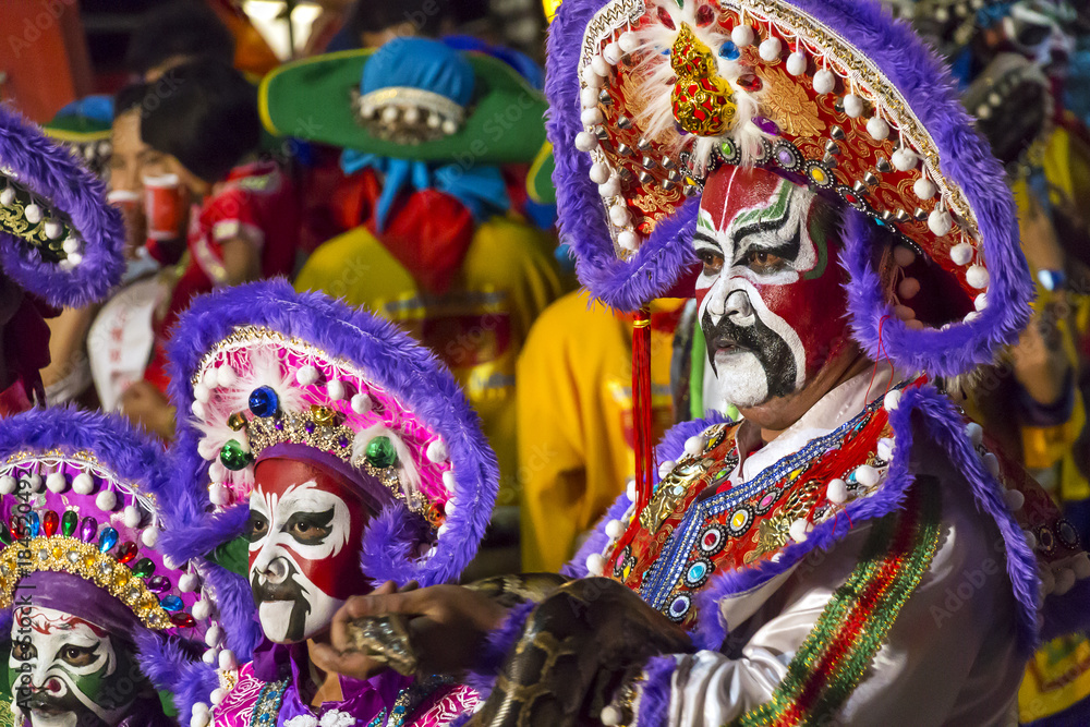 Thailand - FEBRUARY 20, 2015: Peoples with traditional opera costume in the parade.Chinatown parade is the biggest and most popular of the annual parades for the Chinese new year. Thailand - FEBRUARY 20, 2015: Peoples with traditional opera costume in the parade.Chinatown parade is the biggest and most popular of the annual parades for the Chinese new year.