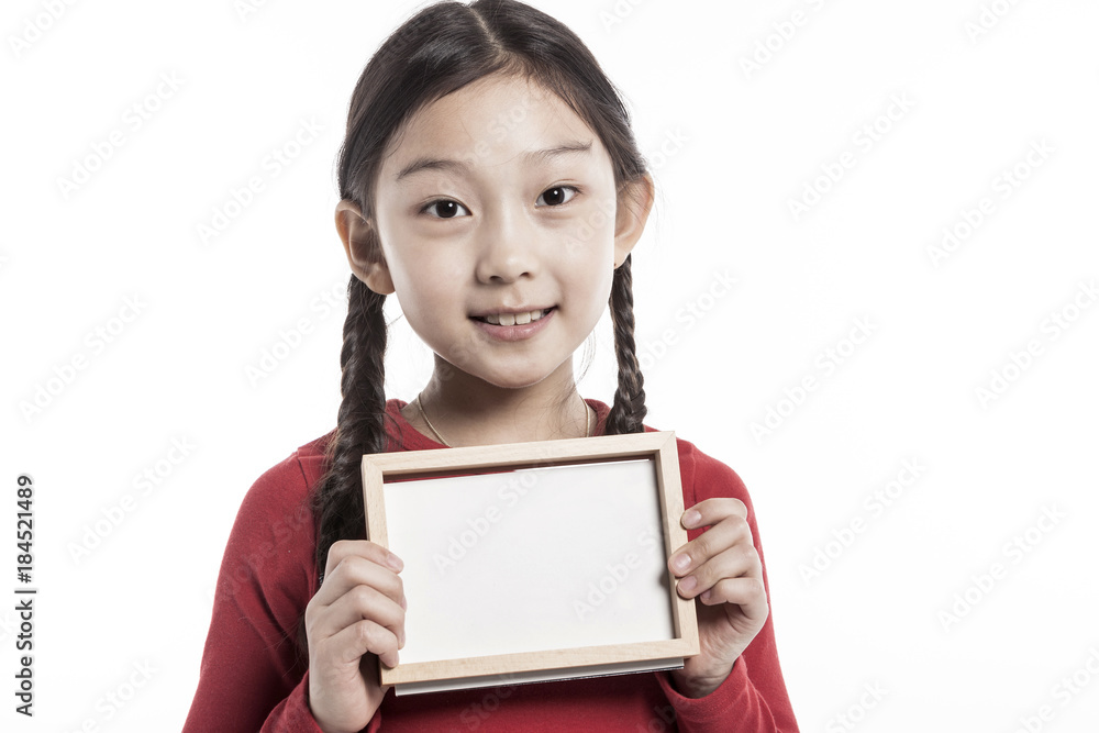 girl(kid) hand hold a photo frame isolated on the white background. girl(kid) hand hold a photo frame isolated on the white background.