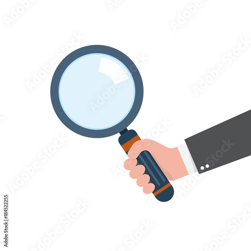 Magnifying glass in the hand. Vector illustration.