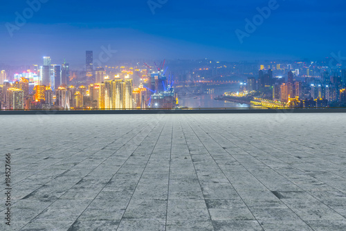 Road pavement and city skyline
