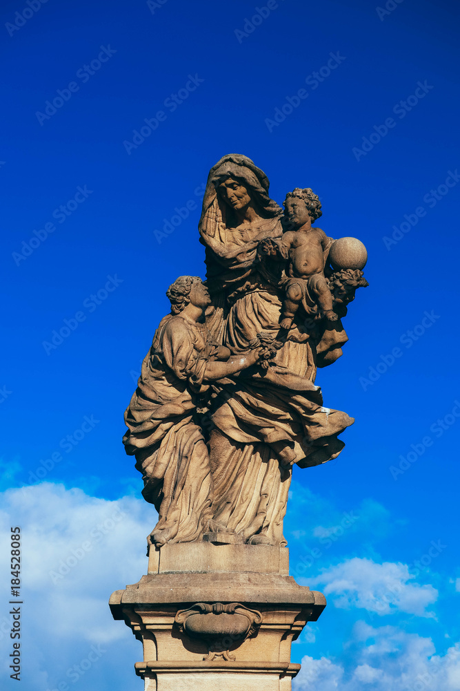 Czech, Prague, gothic sculpture of the Saint Anne on the Charles bridge. Prague, medieval art, statue on the bridge of King Charles. Czech, Prague, gothic sculpture of the Saint Anne on the Charles bridge. Prague, medieval art, statue on the bridge of King Charles.
