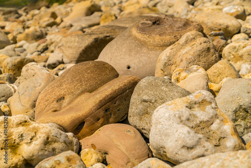 Stones at Osmington Bay, Osmington Mills, near Weymouth, Jurassic Coast, Dorset, UK photo