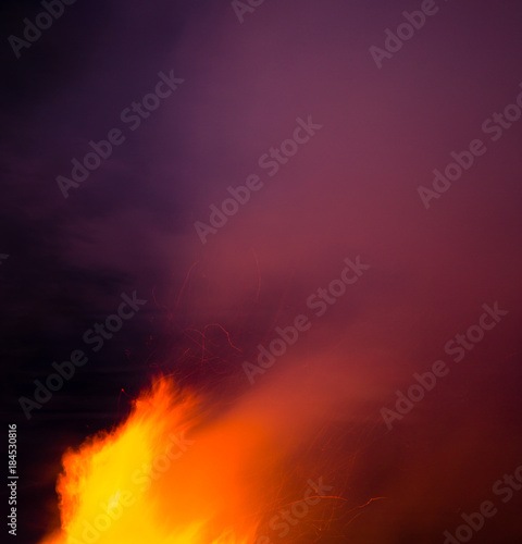 fire with smoke on a black background