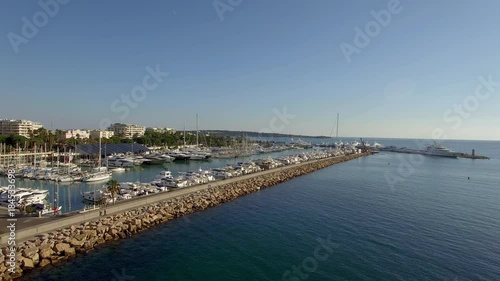 Wallpaper Mural Aerial shot flying next to a pier in Cannes during golden hour Torontodigital.ca