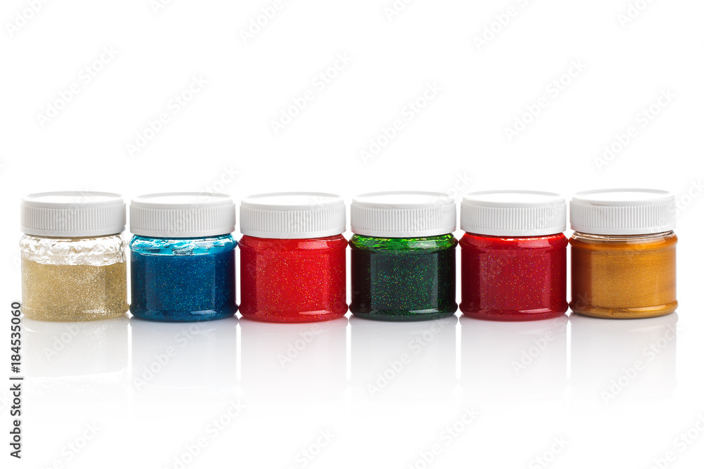 Large set of gouache paint cans in a row. Colorful paints isolated on white Large set of gouache paint cans in a row. Colorful paints isolated on white