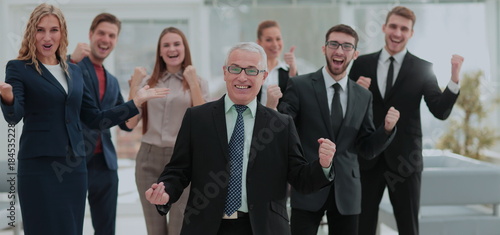 Successful business people looking happy and confident