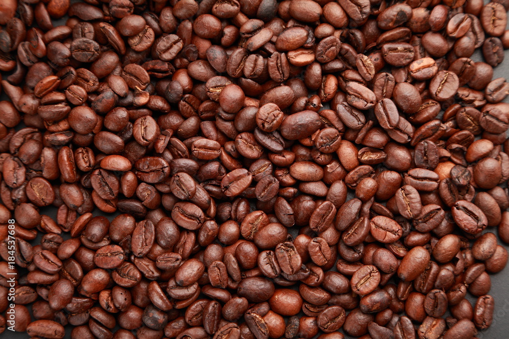 Coffee beans/ Coffee beans scattered on the table Coffee beans/ Coffee beans scattered on the table