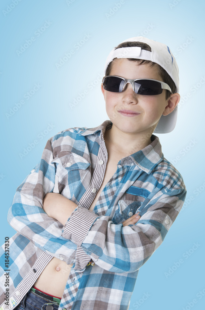 Portrait of a happy schoolboy isolated on a studio background Portrait of a happy schoolboy isolated on a studio background