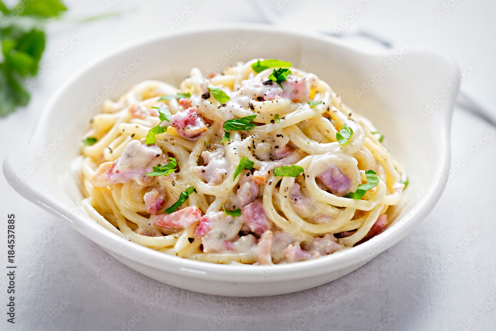 Spaghetti carbonara with bacon and fresh parsley Spaghetti carbonara with bacon and fresh parsley