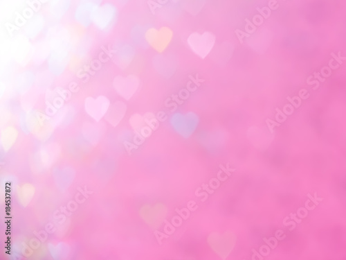 Pink and white heart bokeh light abstract background texture. Christmas and Valentine's pattern bokah, colorful wallpaper.